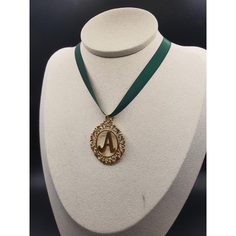 medalla inicial